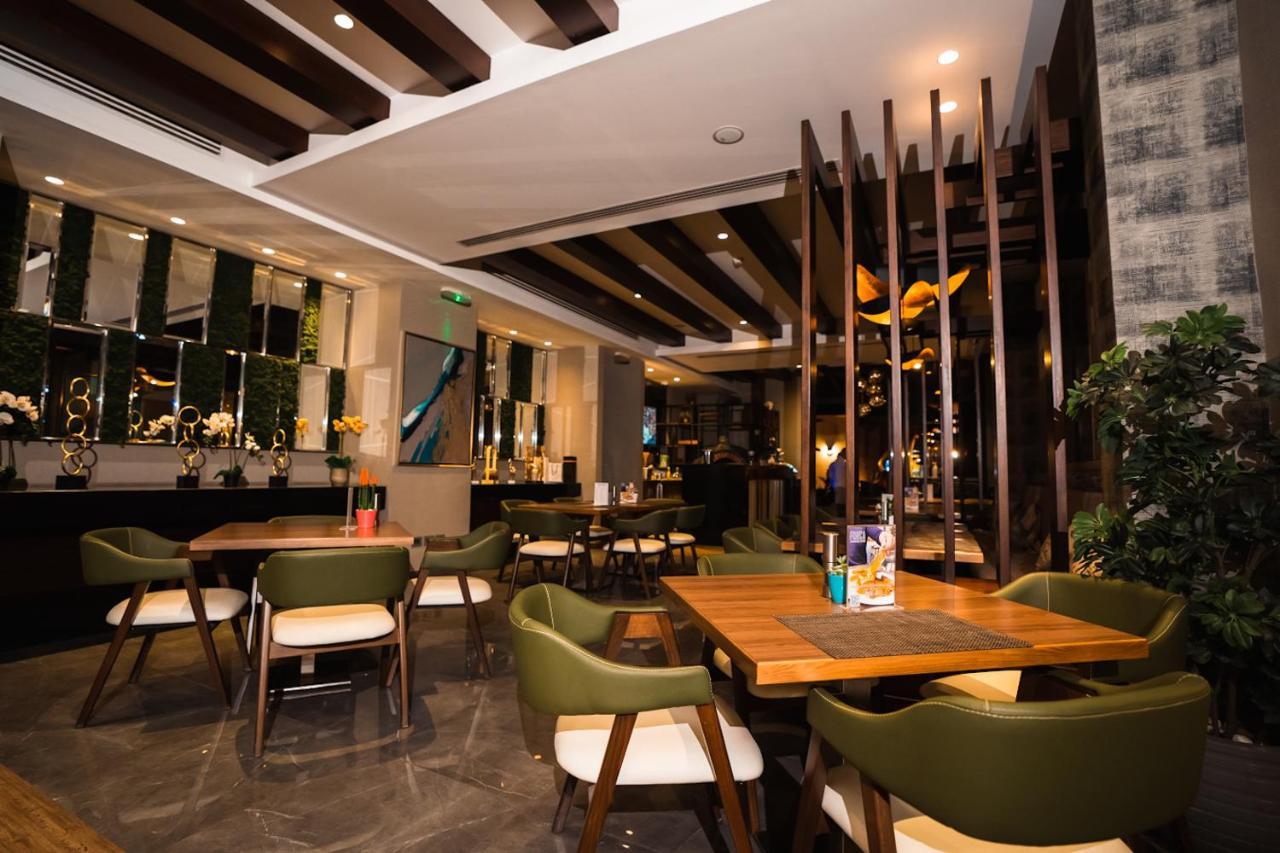 The Compass Hotel Amman Exterior photo