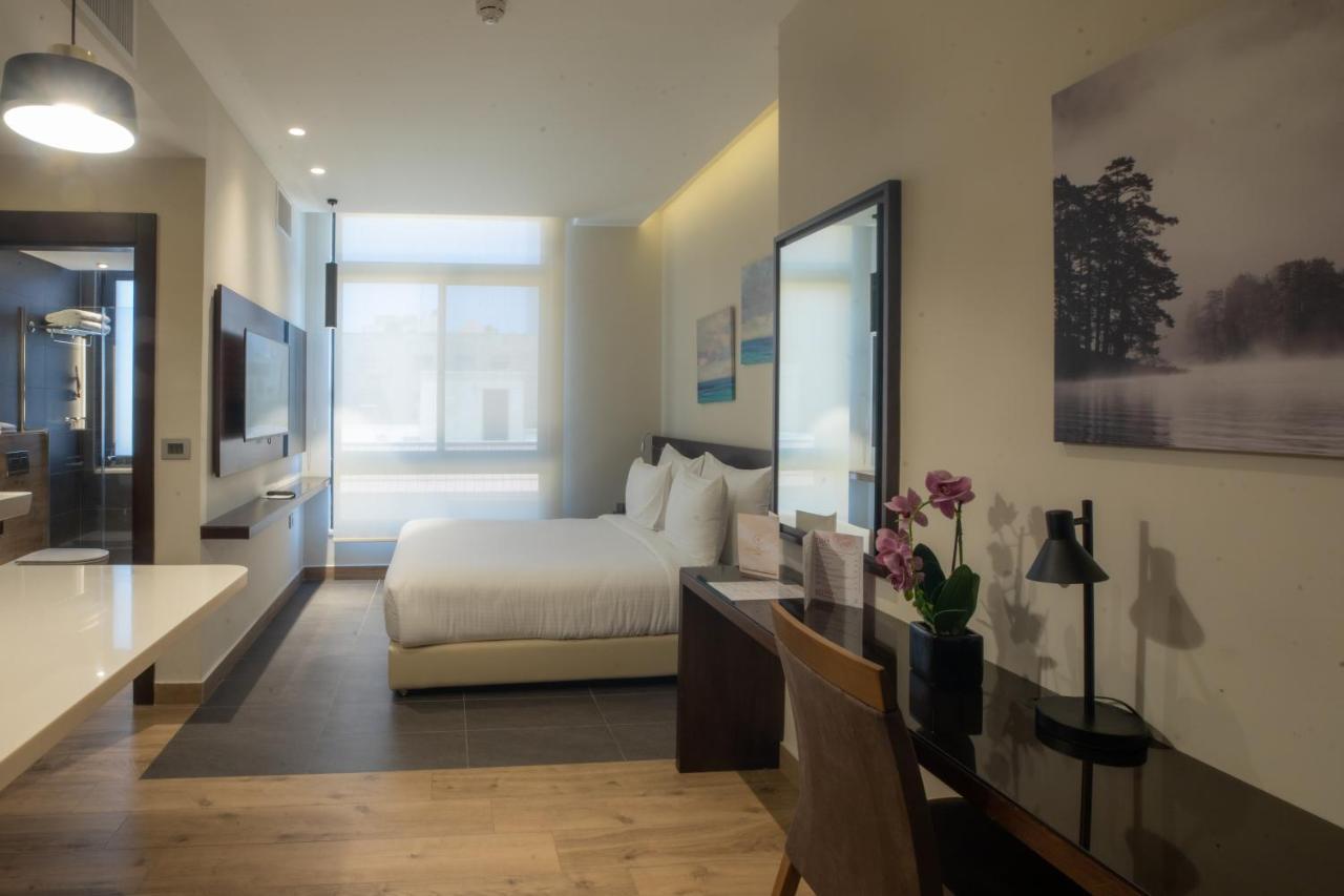 The Compass Hotel Amman Exterior photo