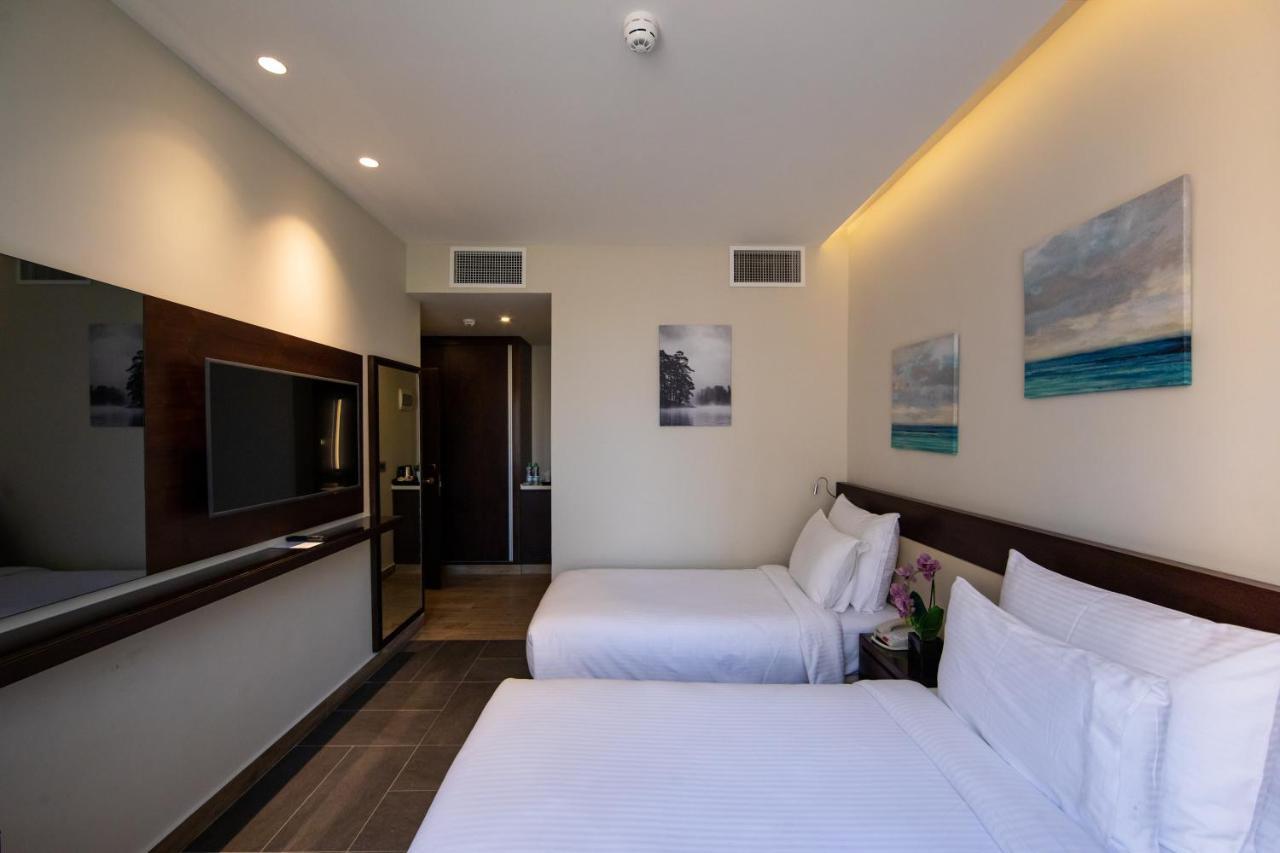 The Compass Hotel Amman Exterior photo