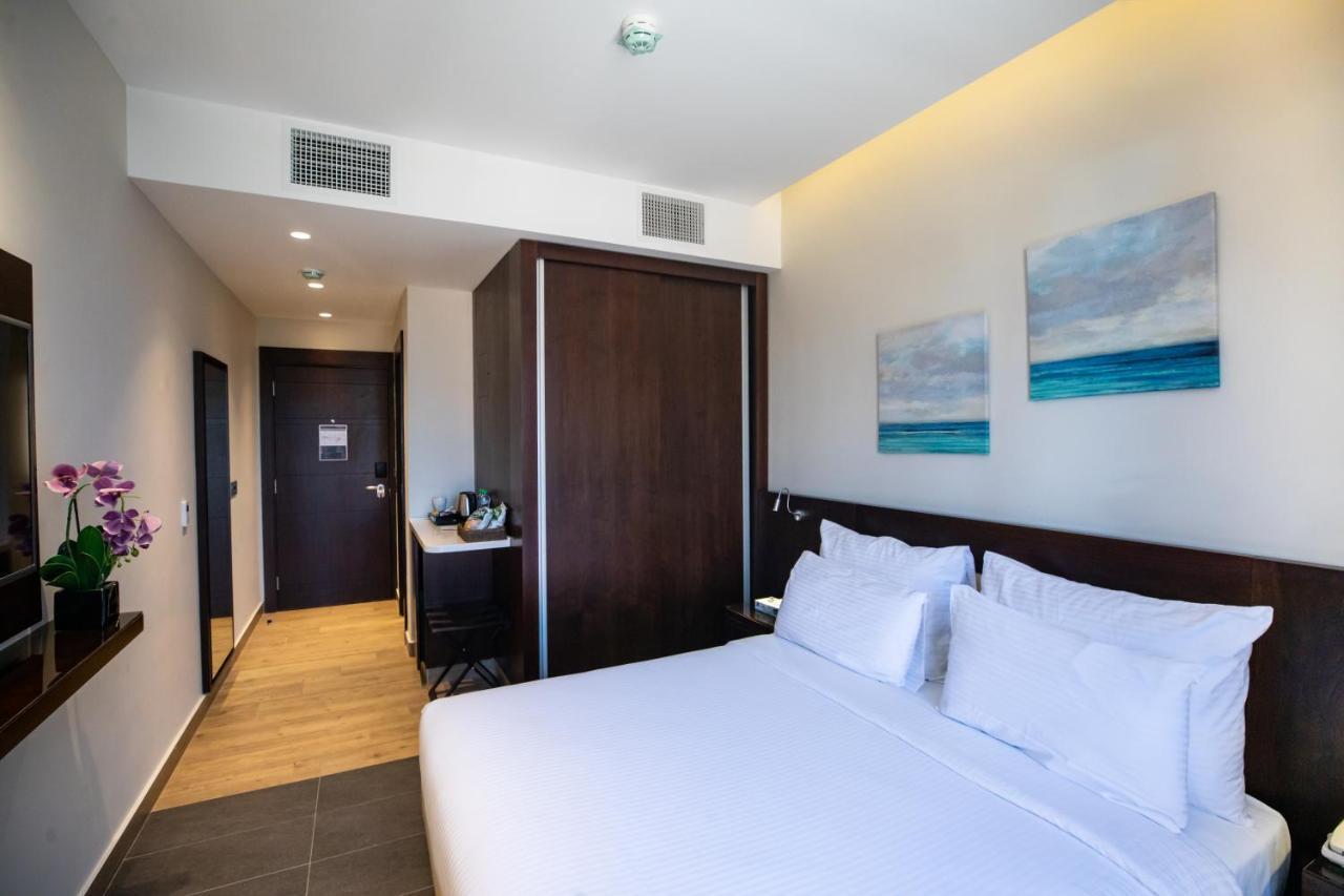 The Compass Hotel Amman Exterior photo